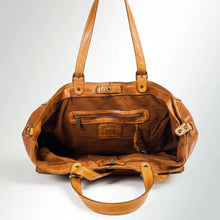 Load image into Gallery viewer, Inside the Avalon Italian leather tote showing fabric lining, zip pocket, key clip and snap-tab closure