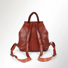 Load image into Gallery viewer, Back view of the Sawyer cognac leather backpack with adjustable leather straps and top handle