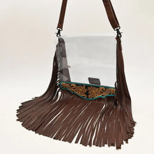 Load image into Gallery viewer, Curtain Call hand tooled leather fringe clear crossbody purse with fringe draped, angled view