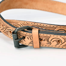 Load image into Gallery viewer, Close-up of the tooled leather crossbody strap and belt-style buckle on the Cinch purse