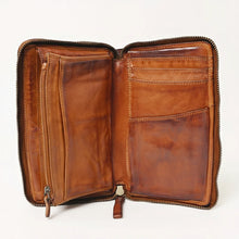 Load image into Gallery viewer, Inside the cash compartment of a cognac Italian leather wallet with center zip pocket, bill section, card slots, and large slip pocket