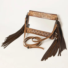 Load image into Gallery viewer, Brass Tacks hand tooled leather fringe clear crossbody purse in Tan with adjustable strap, angled view