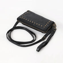 Load image into Gallery viewer, Top view of black studded leather organizer crossbody with zip-around closure and adjustable strap