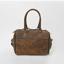 Load image into Gallery viewer, Back view of the Bowie western satchel showing the clean distressed leather panel with the American Darling leather patch and no exterior pockets