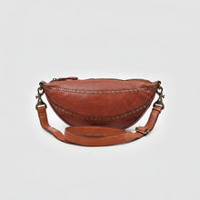 Load image into Gallery viewer, Comet cognac Italian leather crescent sling bag with two rows of star studs and adjustable strap