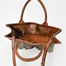 Load image into Gallery viewer, Solstice tote open, showing the magnetic snap tab and lined interior with zip pockets