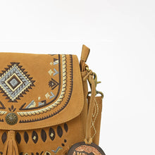Load image into Gallery viewer, Close-up of the Lodestar flap's diamond medallion embroidery, rope-stitch arches and brass concho