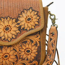 Load image into Gallery viewer, Close-up of Solana's hand-carved sunflowers, stamped background and scroll-tooled strap