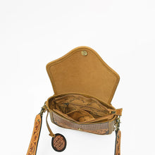 Load image into Gallery viewer, Solana crossbody open, showing the suede flap underside, magnetic snap and zip-top interior