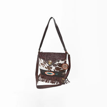 Load image into Gallery viewer, Ocotillo hand-tooled leather and hair-on cowhide fringe bag with cactus concho, three-quarter view