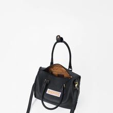 Load image into Gallery viewer, Dennison black leather NFR speedy bag with hand-braided detailing and Wrangler Las Vegas 2026 charm