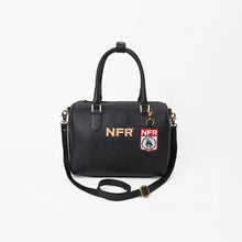 Load image into Gallery viewer, Pozzi black pebbled leather NFR speedy bag with embroidered PRCA shield patch and removable strap
