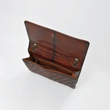Load image into Gallery viewer, Sorrel flap bag open, showing the magnetic snap, chain grommets and lined interior with zip pocket
