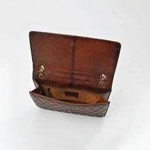 Load image into Gallery viewer, Bourbon flap bag open, showing the magnetic snap, chain grommets and lined interior with zip pocket