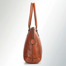 Load image into Gallery viewer, Side view of the Harley cognac leather dome satchel showing the zip-around top, diamond quilting and rolled handles
