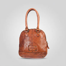 Load image into Gallery viewer, Harley diamond quilted leather dome satchel in cognac with the leather logo patch, brass rings and brass base feet
