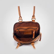 Load image into Gallery viewer, Inside the Harley cognac leather satchel showing cotton lining, zip pocket, slip pocket and key clip
