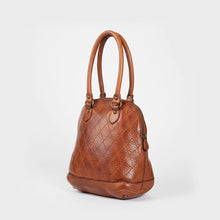 Load image into Gallery viewer, Harley diamond quilted Italian leather dome satchel in cognac, angled view showing the side zipper and pebbled leather

