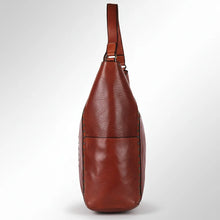Load image into Gallery viewer, Side of the Sedona Italian leather tote showing slip pocket, riveted seam and shoulder strap
