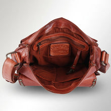 Load image into Gallery viewer, Inside of cognac leather saddle crossbody with fabric lining, zip pocket, and key clip
