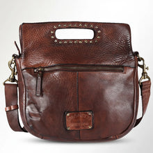 Load image into Gallery viewer, Back view of the Selene brown leather handbag with a full-width zip pocket, embossed logo patch, and studded cut-out handle
