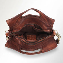 Load image into Gallery viewer, Top-down view inside the Selene brown leather handbag showing the zip-top opening, interior zip pocket, slip pocket, and fabric lining
