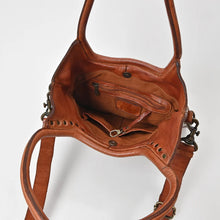 Load image into Gallery viewer, Inside the Sienna cognac leather tote showing magnetic snap closure, interior zip pocket, slip pocket and key clip
