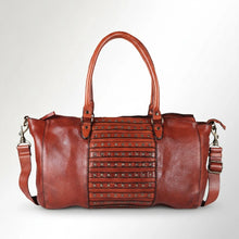 Load image into Gallery viewer, Rowan studded leather satchel in cognac, front view with the star-studded center panel, rolled handles and adjustable strap
