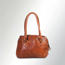 Load image into Gallery viewer, Front of the Marlowe cognac Italian leather satchel tote with rolled handles and antique brass rings
