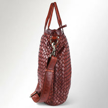 Load image into Gallery viewer, Side of the Penelope woven leather tote with silver-tone swivel hook and adjustable crossbody strap
