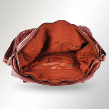 Load image into Gallery viewer, Inside the Penelope woven leather tote showing zip top, fabric lining, zip pocket and slip pockets
