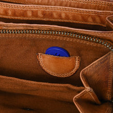 Load image into Gallery viewer, Close-up inside the Wren leather wallet zip compartment showing the small half-moon slip pocket and fabric lining

