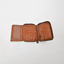 Load image into Gallery viewer, Penny tan leather wallet open flat showing the fold-out ID window, card slots, center zip pocket, and bill compartments
