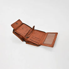 Load image into Gallery viewer, Penny leather wallet fully unfolded at an angle showing the ID window, card slots, center zip pocket, and snap-close pocket
