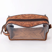 Load image into Gallery viewer, Prairie Bloom clear toiletry bag top view showing hand tooled sunflower bands on both sides of the zipper
