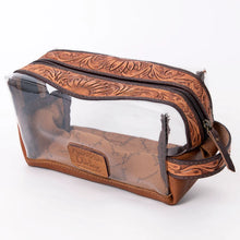 Load image into Gallery viewer, Prairie Bloom clear toiletry bag with tooled sunflower bands, leather base and looped carry handle
