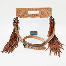 Load image into Gallery viewer, Cinch clear crossbody purse with hand tooled floral top panel, hand slot, long leather fringe and tooled strap
