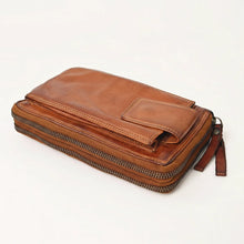 Load image into Gallery viewer, Cognac Italian leather double zip phone wallet lying flat, showing two zip-around compartments and front tab-top phone pocket
