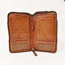 Load image into Gallery viewer, Inside the card compartment of a cognac leather zip wallet with rows of card slots, two ID windows, and a pen loop
