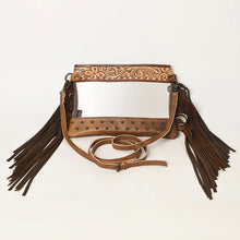 Load image into Gallery viewer, Brass Tacks clear crossbody purse in Tan with hand tooled floral band, brass studs and dark leather fringe

