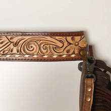 Load image into Gallery viewer, Close-up of the hand tooled floral band, white buckstitch and brass rivet on the Tan Brass Tacks purse
