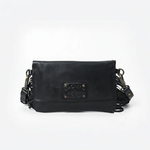 Load image into Gallery viewer, Back view of the Estrella black leather crossbody showing smooth Italian leather, an embossed logo patch, and swivel strap clasps
