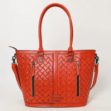 Load image into Gallery viewer, Back of the Maple Creek red tote showing basketweave-stamped leather, tooled handle tabs and two vertical zip pockets including the concealed carry pocket
