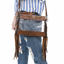 Load image into Gallery viewer, Brass Tacks Brown fringe clear crossbody worn at the hip, studded base and tooled band

