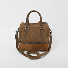 Load image into Gallery viewer, Buckskin brown diamond quilted leather satchel with hair-on cowhide base, studded band and detachable strap
