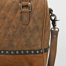 Load image into Gallery viewer, Close-up of Buckskin diamond quilting, silver-tone studs on black leather and swivel clip
