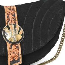 Load image into Gallery viewer, Close-up of Sundown cactus sunburst concho, hand-tooled floral leather and curved suede quilting
