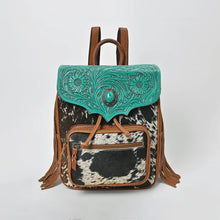 Load image into Gallery viewer, Greenwood turquoise hand-tooled leather backpack with hair-on cowhide body and concho medallion
