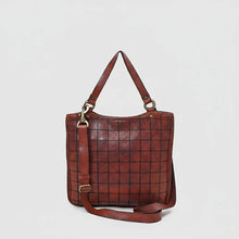 Load image into Gallery viewer, Front of the Winslow cognac Italian leather grid tote with brass rings and detachable crossbody strap
