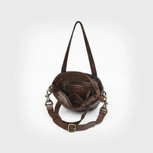Load image into Gallery viewer, Inside the Riva dark brown leather mini tote showing zip top, zip pocket, slip pocket and key clip
